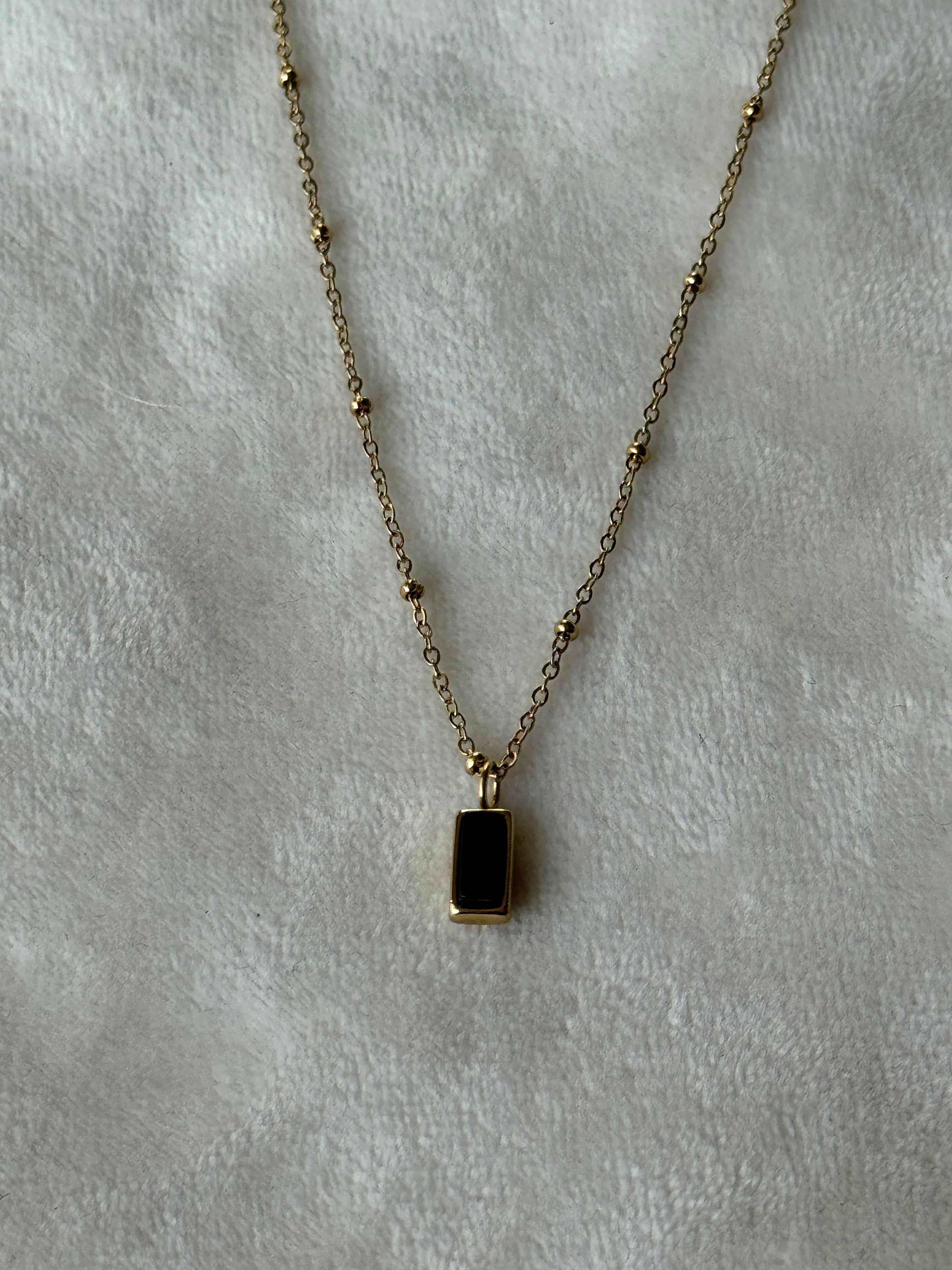 Ketting goud/zwart steentje