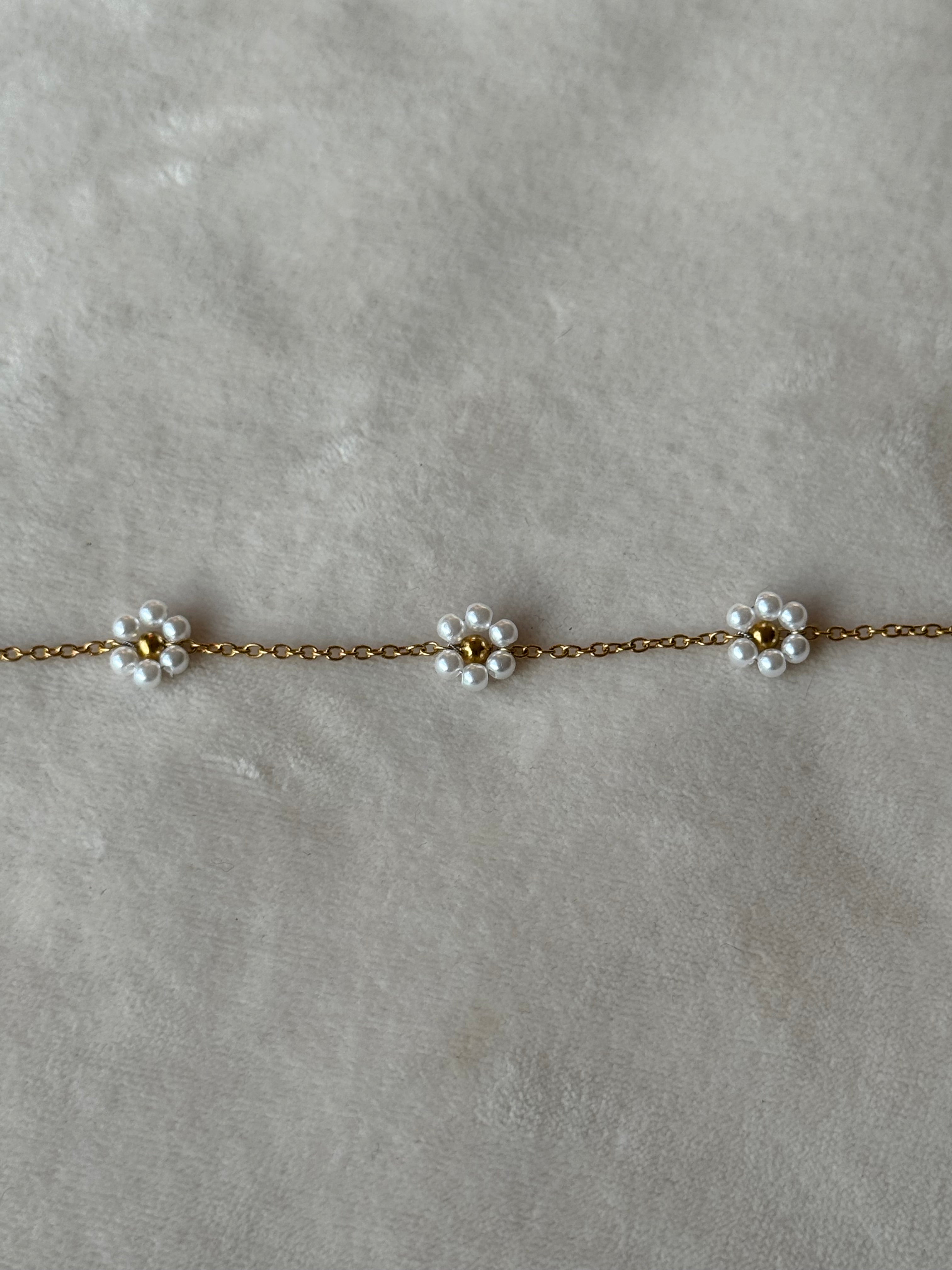 Armband goud bloemen