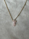 Ketting goud/roze strikje