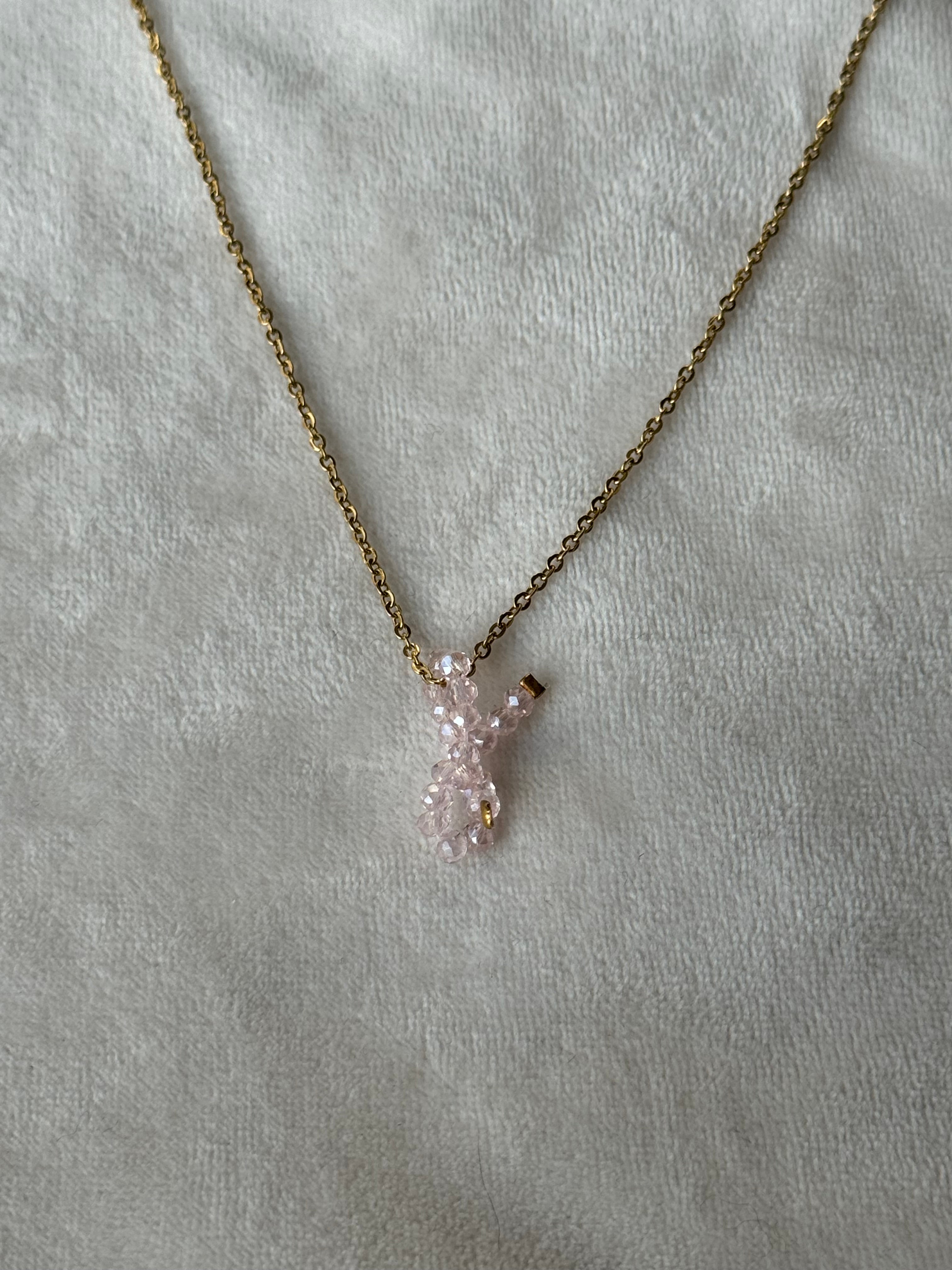 Ketting goud/roze strikje