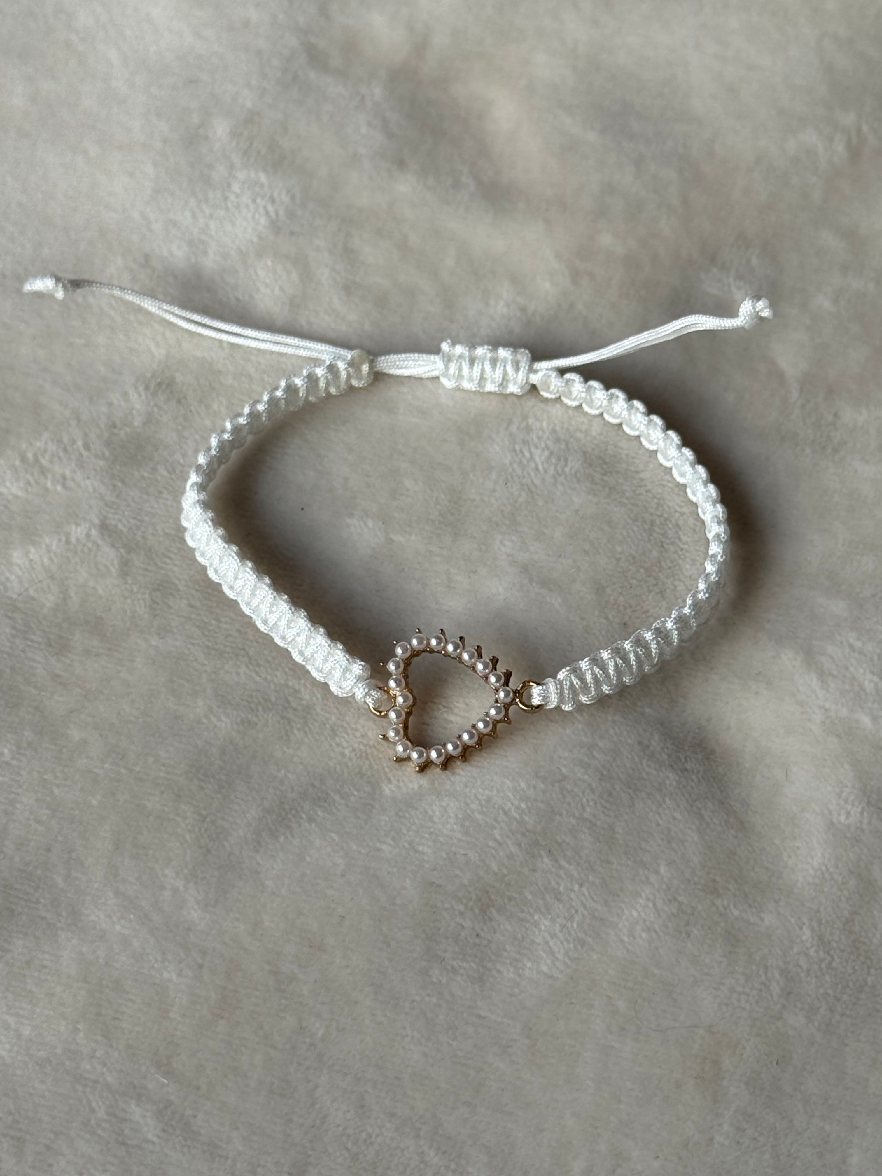 Armband wit/goud hartje