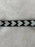 Armband zwart/grijs hartjes