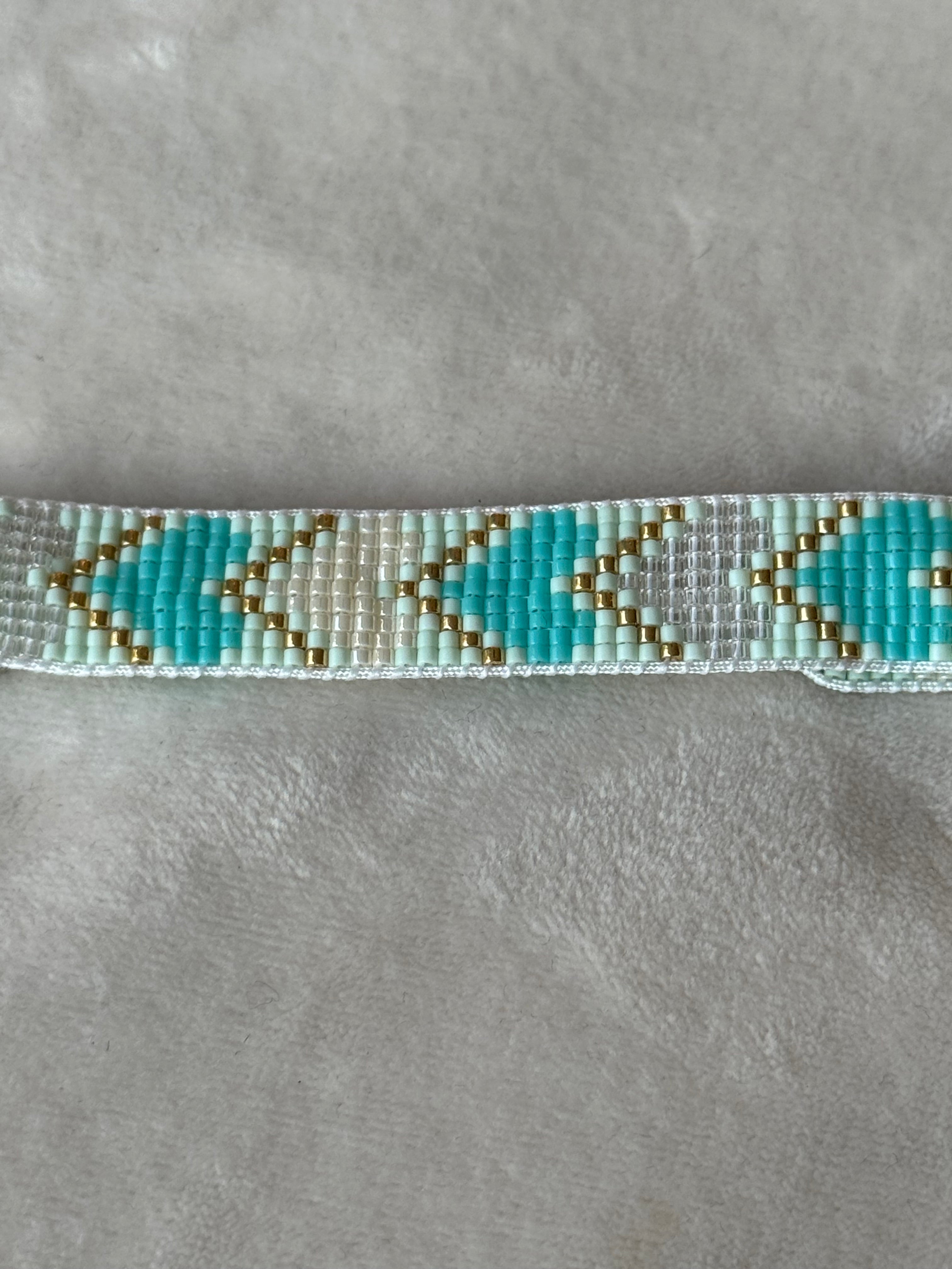 Armband blauw/grijs/goud hartjes