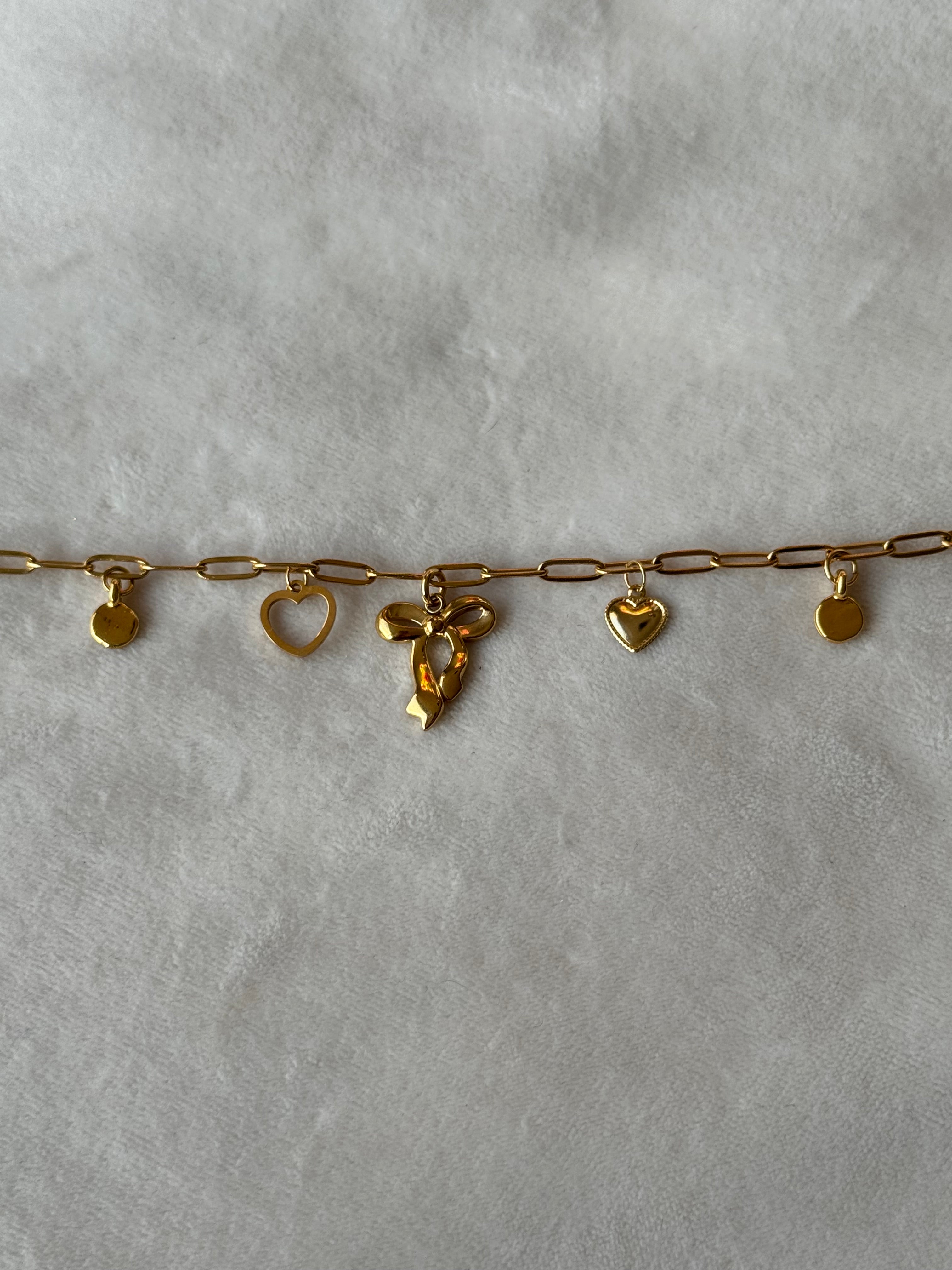 Armband goud strikje