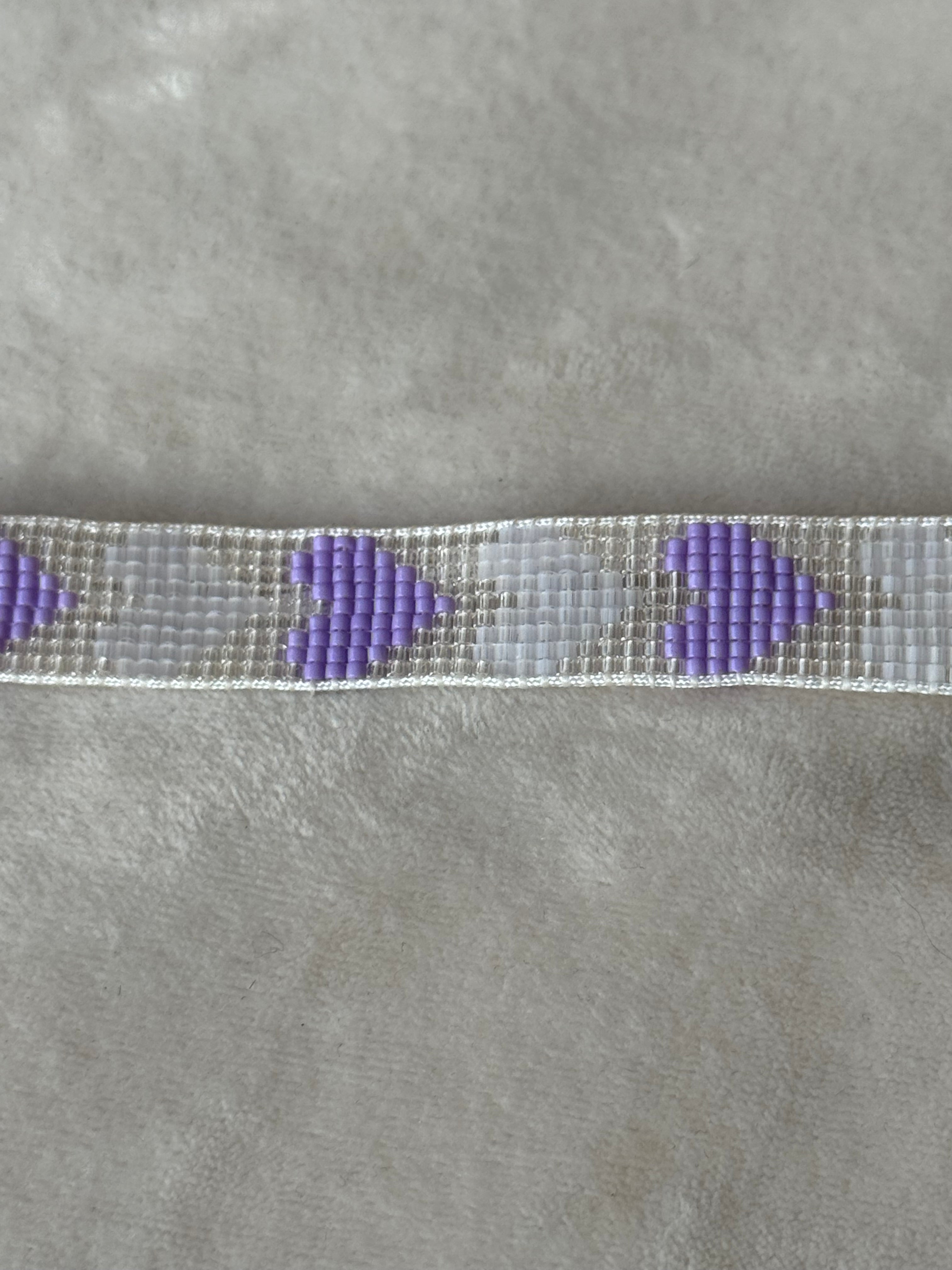 Armband wit/grijs/paars hartjes