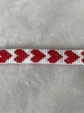 Armband wit/rood hartjes