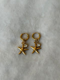 Oorbellen goud/wit zeester