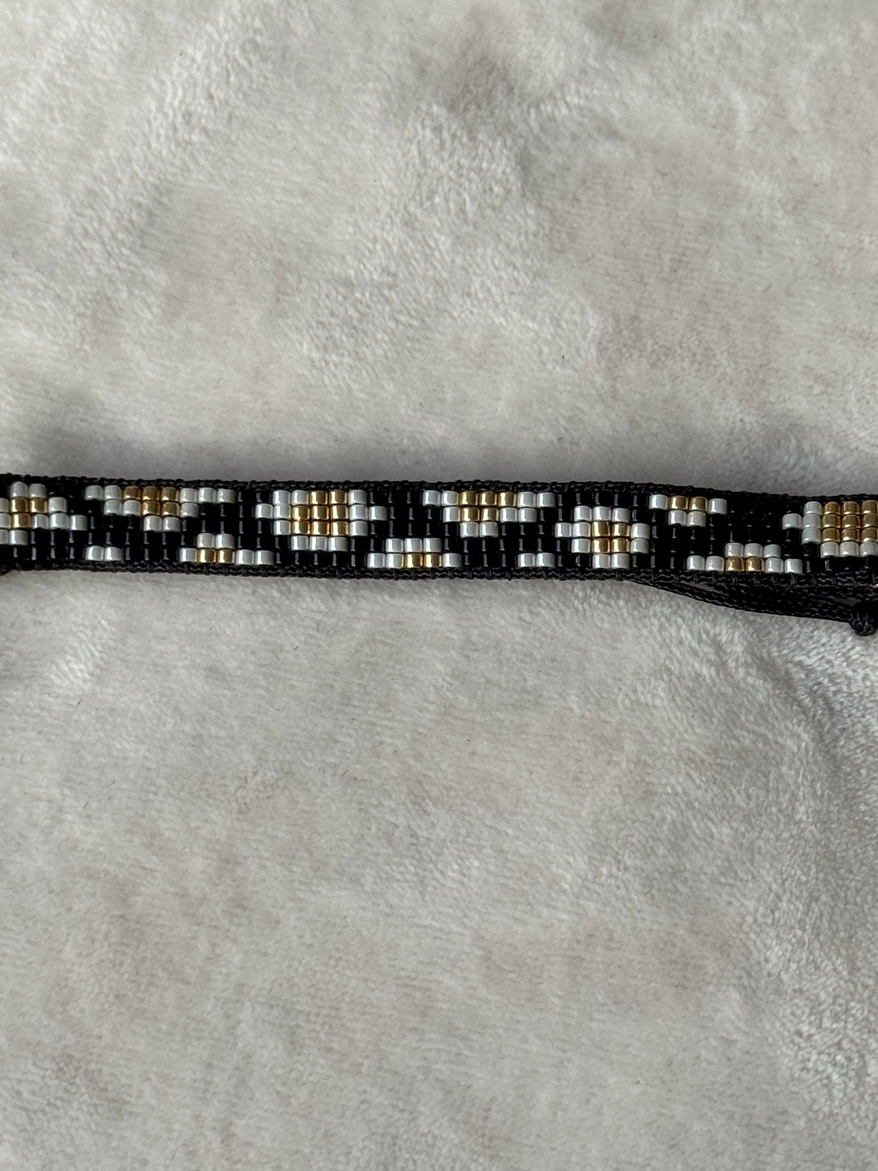 Armband zwart/goud/wit