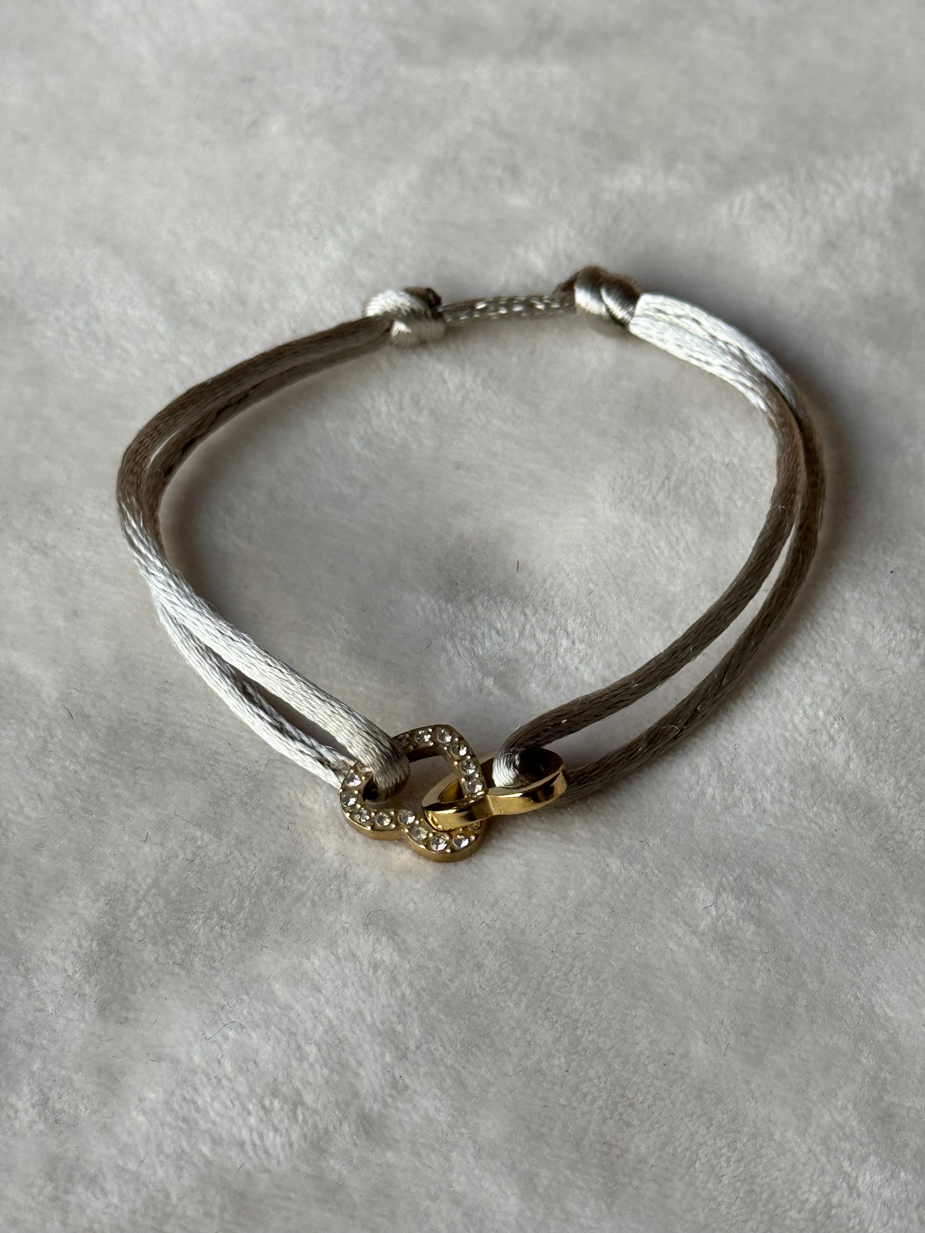 Armband goud/beige hartjes