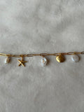 Armband goud zee