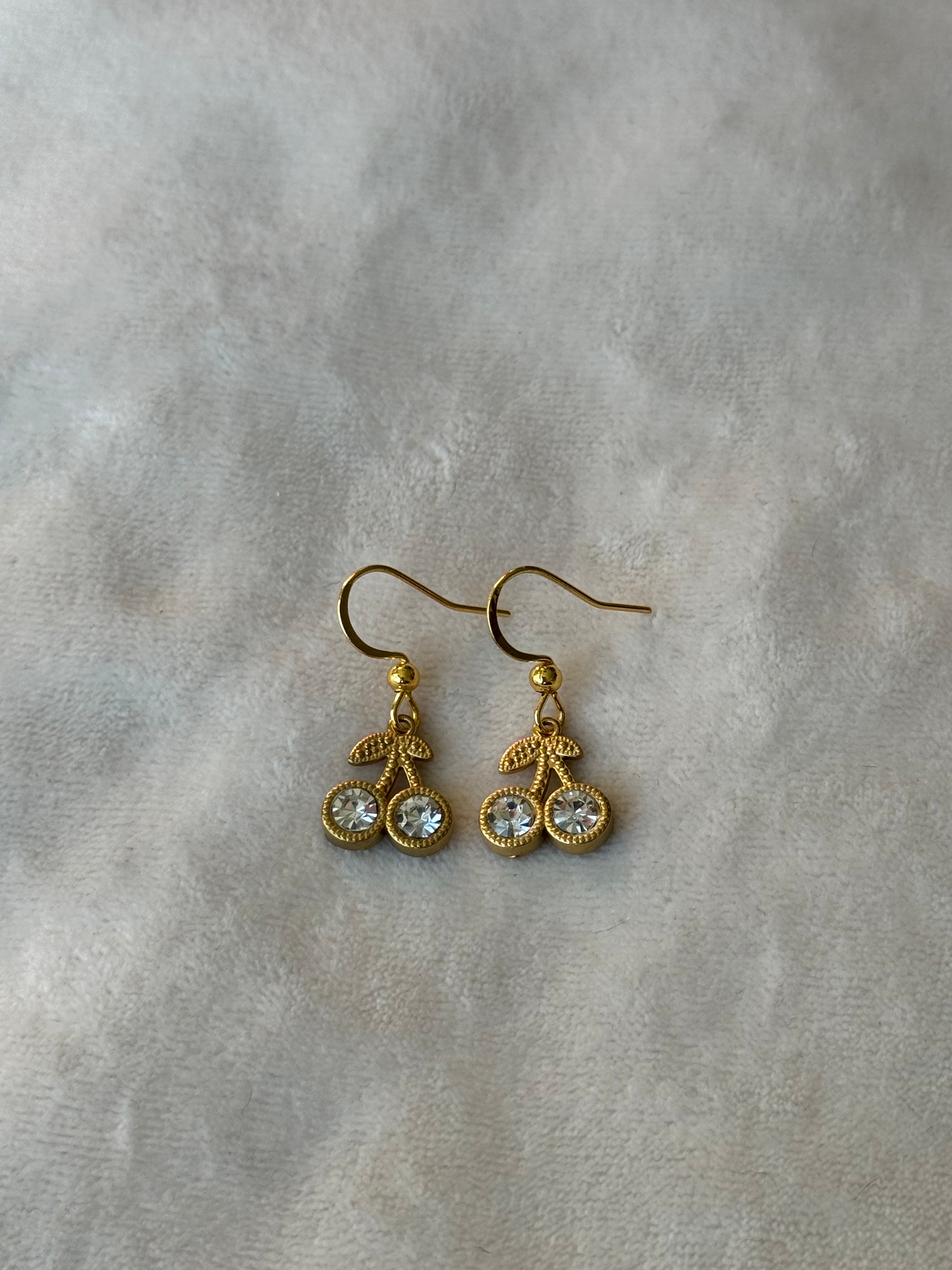 Oorbellen goud/wit kersje