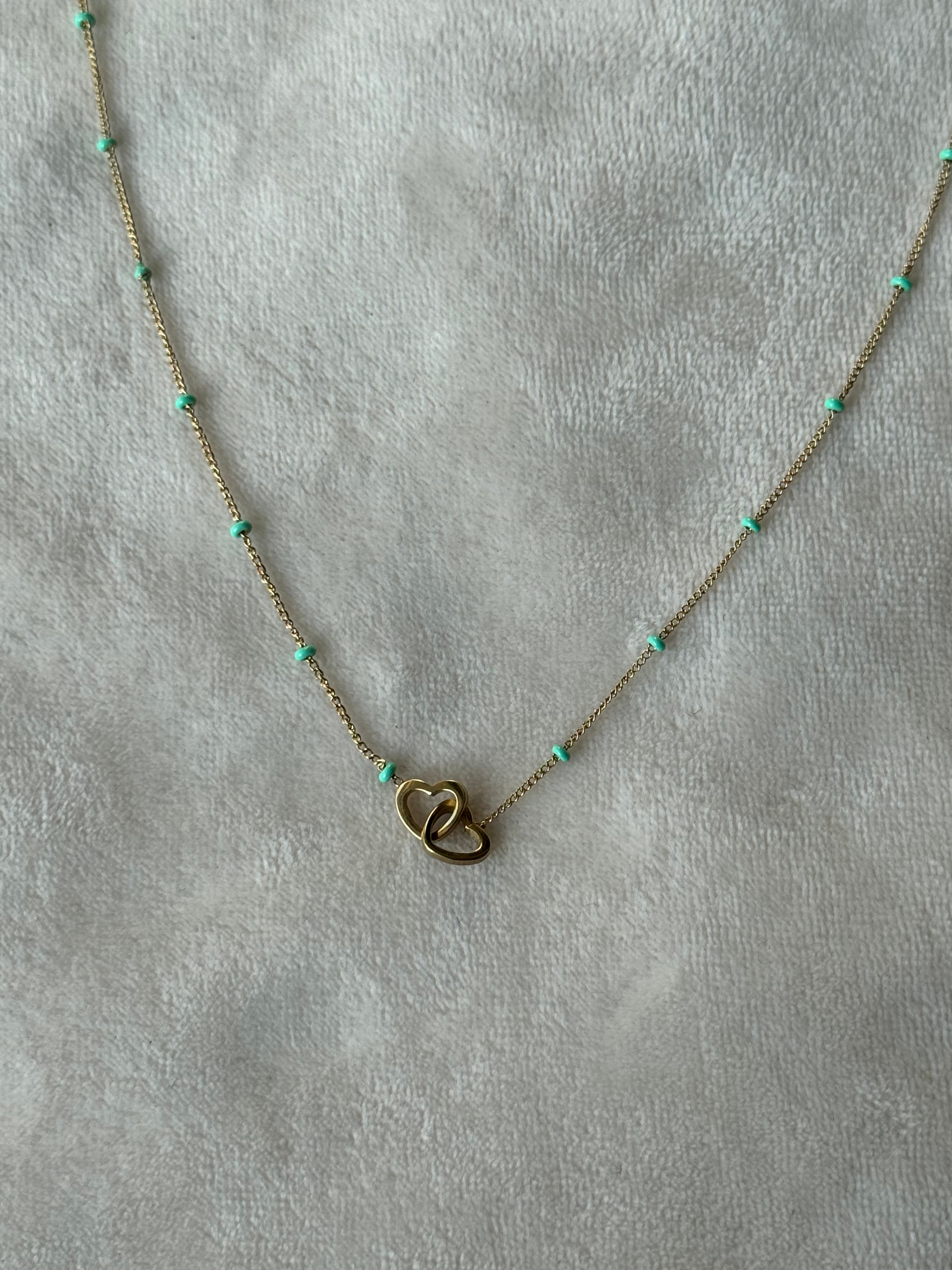 Ketting goud/turquoise hartjes