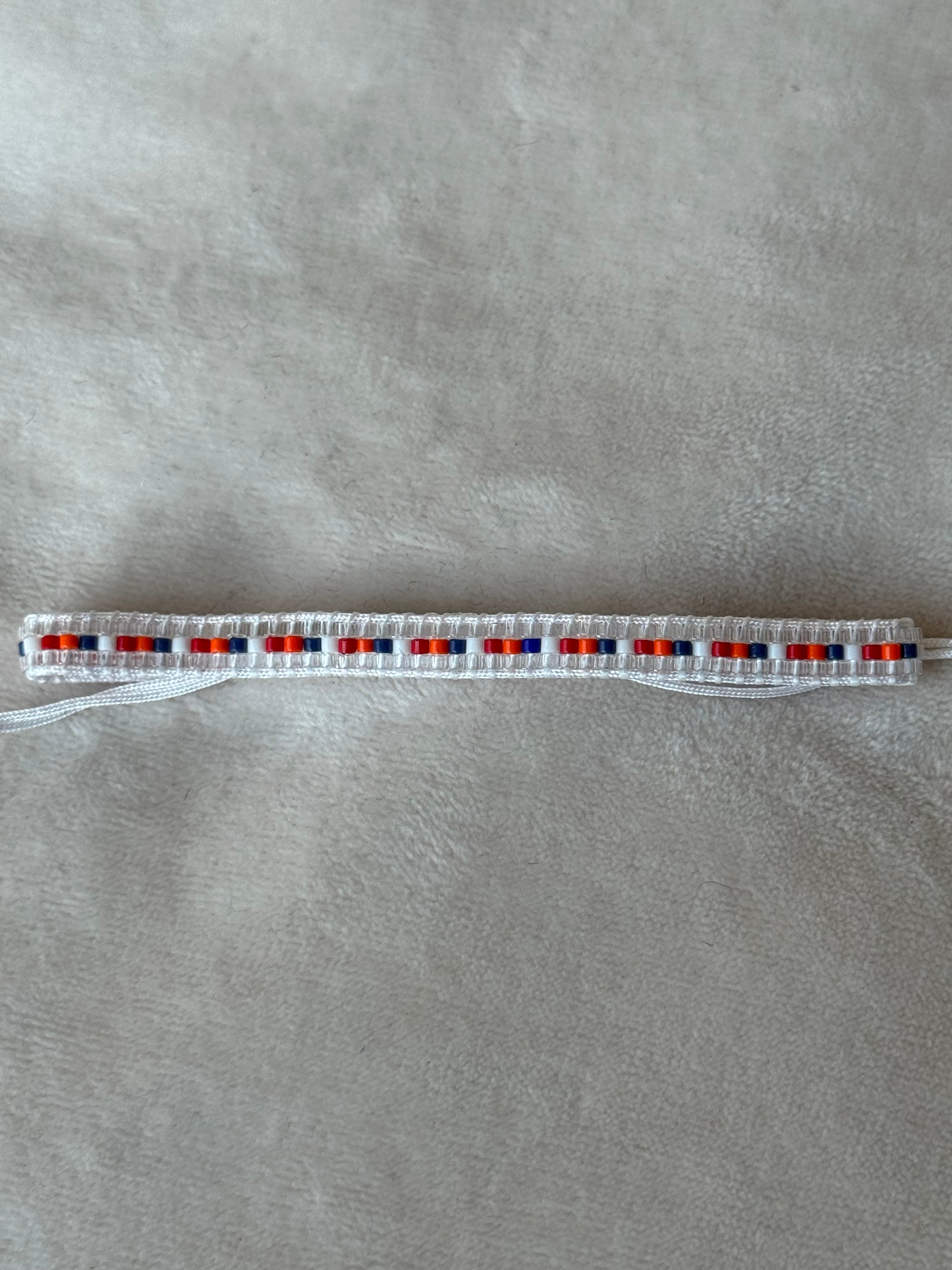 Armband rood/wit/blauw oranje