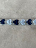 Armband grijs/blauw hartjes