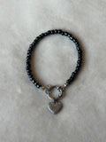 Armband zwart/zilver hartje