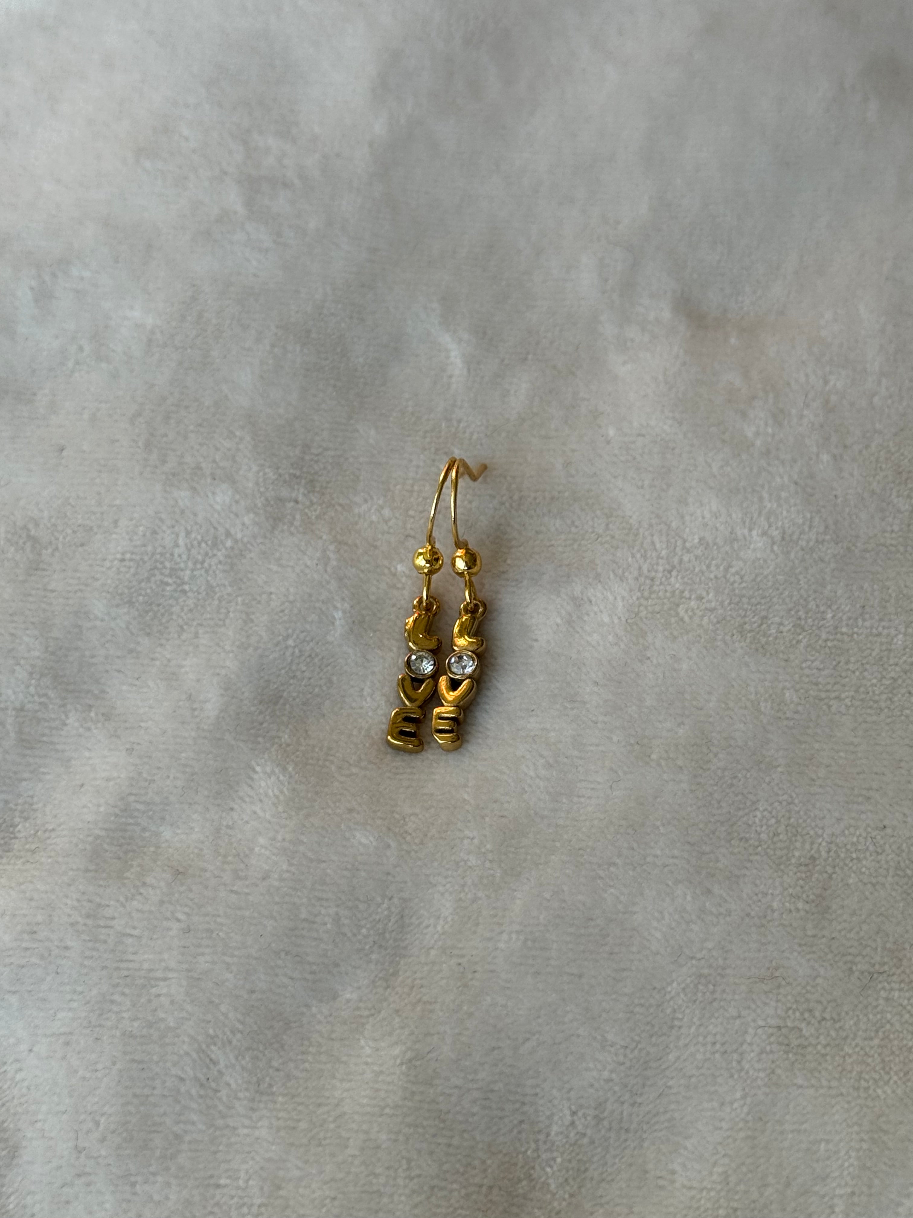 Oorbellen goud/wit love