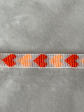 Armband wit/oranje hartjes
