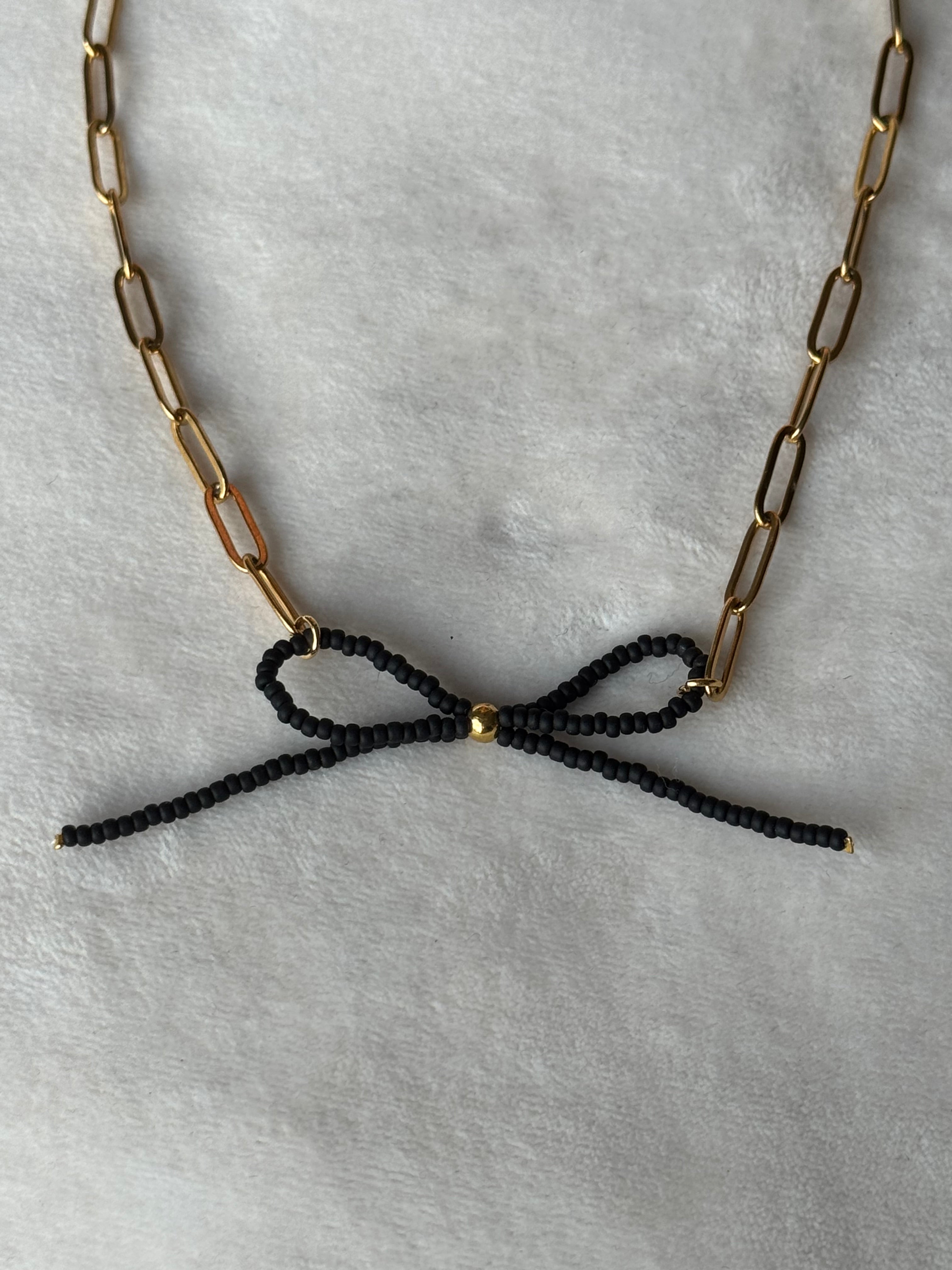 Ketting goud/zwart strik