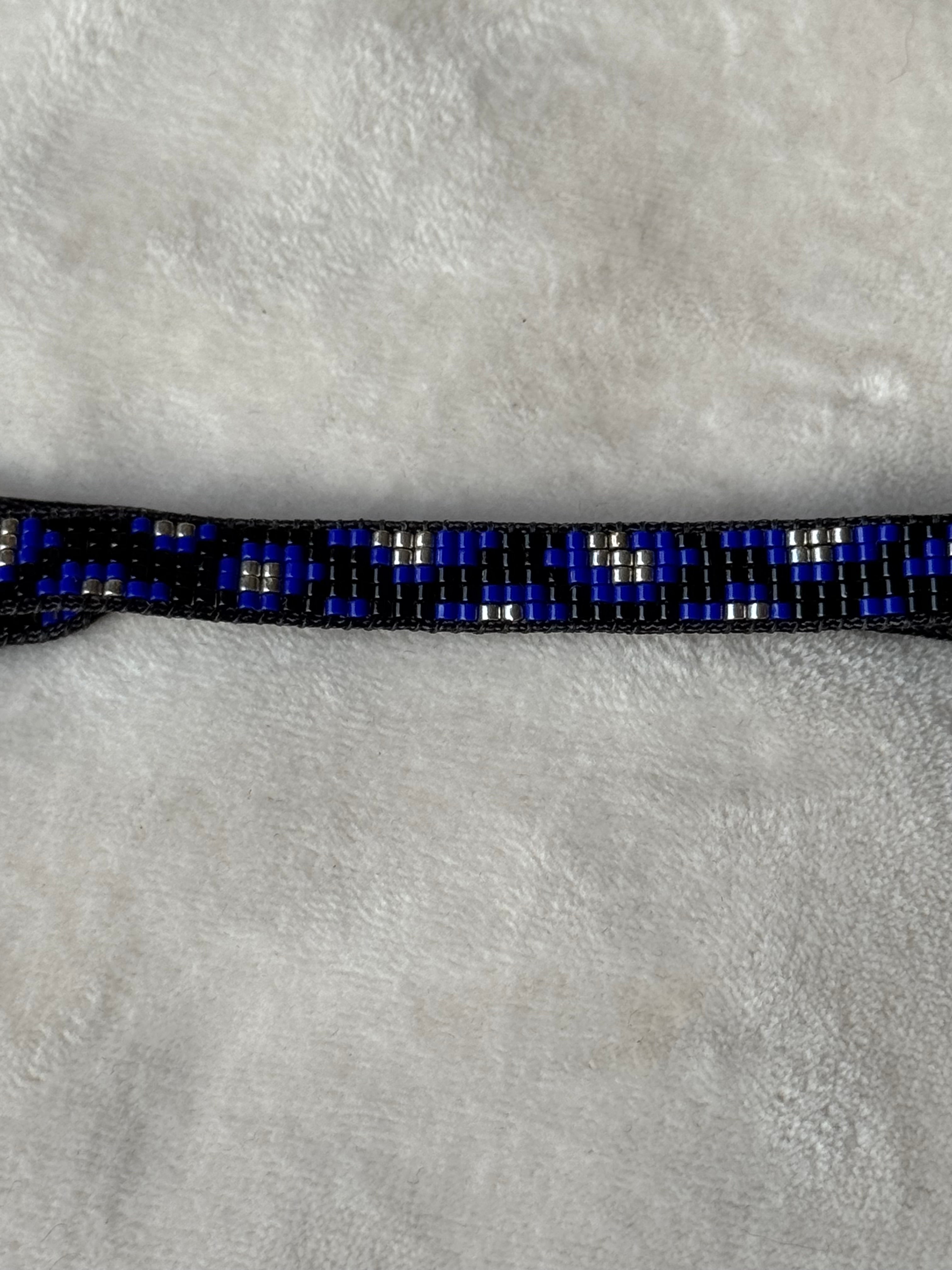 Armband zwart/goud/blauw
